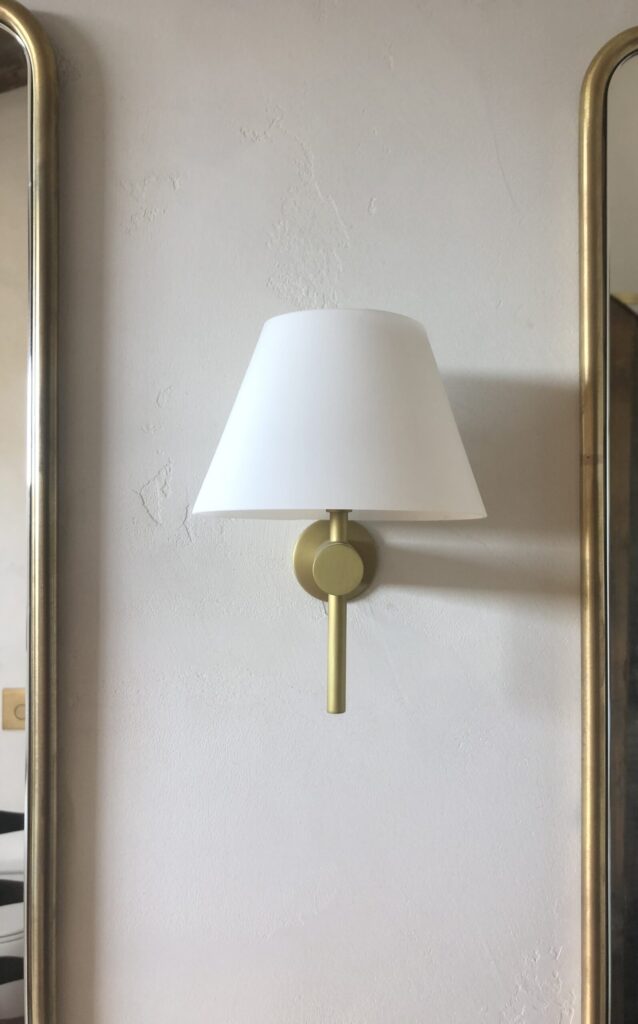 Home Electrician installed a classic wall lamp sconce in a residential home