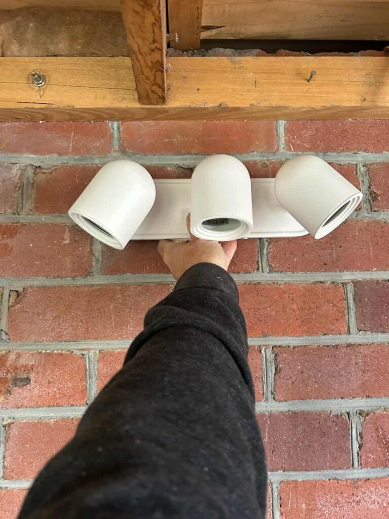 Home Wall-mounted security light installed by Seaside Electrical, illuminating the outdoor area of a home